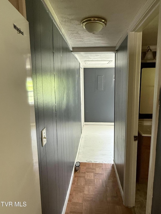 3126 Blackburn Ave, Kingsport, TN 37660 - hall with wood walls, electric panel, and a textured ceiling