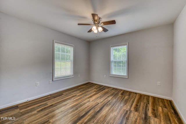 1367 Milligan Hwy, Johnson City, TN 37601 - spare room with dark wood-type flooring and ceiling fan