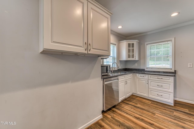 1367 Milligan Hwy, Johnson City, TN 37601 - kitchen with stainless steel appliances, ornamental molding, dark wood finished floors, glass insert cabinets, and white cabinets