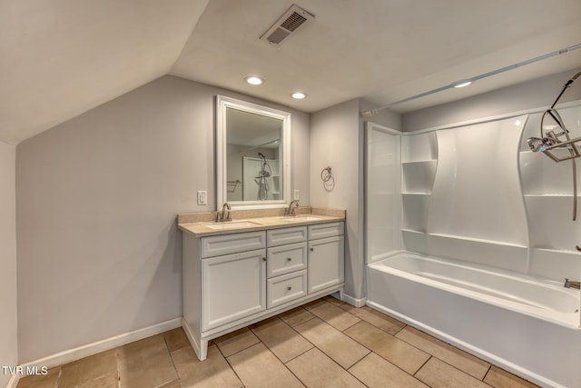 1367 Milligan Hwy, Johnson City, TN 37601 - bathroom with double vanity,  shower combination, recessed lighting, vaulted ceiling, and tile patterned floors