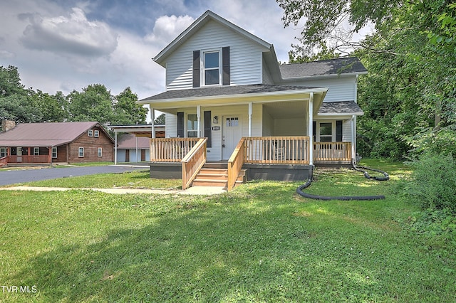 1010 Gibson Mill Rd, Kingsport, TN 37660 - view of front of home featuring covered porch, a front lawn, and roof with shingles