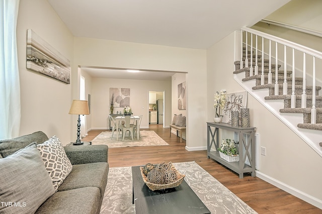 1010 Gibson Mill Rd, Kingsport, TN 37660 - living room with wood finished floors and stairway