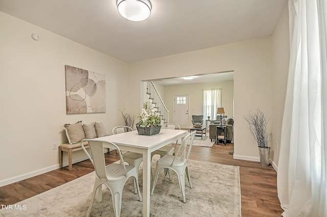 1010 Gibson Mill Rd, Kingsport, TN 37660 - dining room featuring stairway and wood finished floors