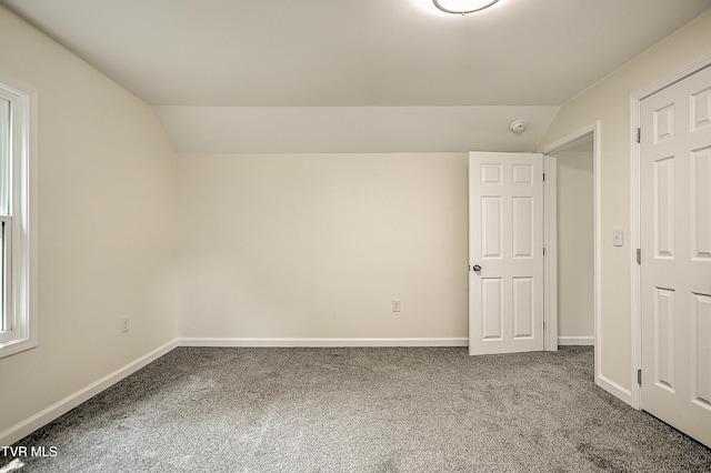 1010 Gibson Mill Rd, Kingsport, TN 37660 - unfurnished bedroom with vaulted ceiling and carpet flooring