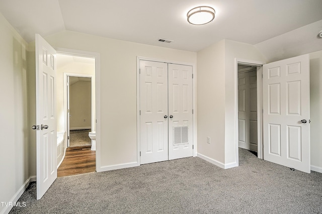 1010 Gibson Mill Rd, Kingsport, TN 37660 - unfurnished bedroom with carpet flooring, vaulted ceiling, and a closet