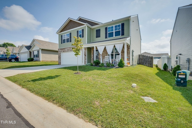 1233 Stamp Lodge Rd, Kingsport, TN 37660 - view of front of property featuring a porch, concrete driveway, a garage, and stone siding