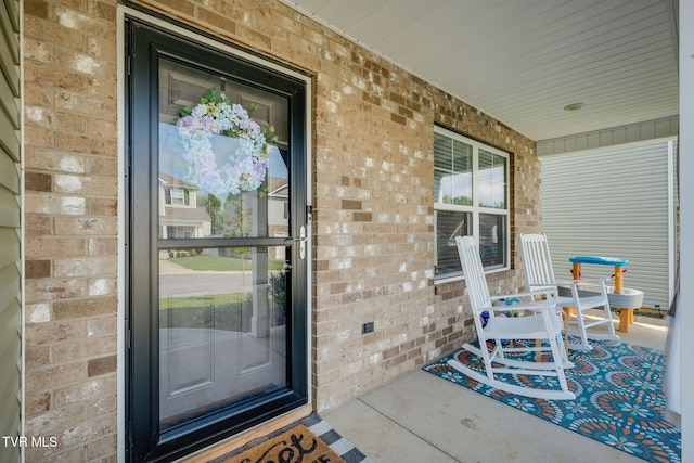 1233 Stamp Lodge Rd, Kingsport, TN 37660 - doorway to property with a porch and brick siding