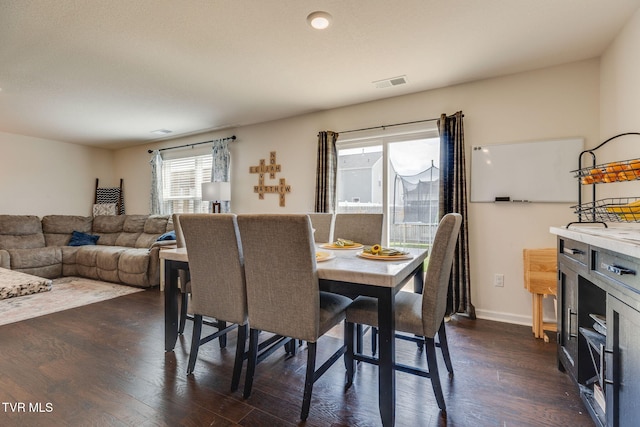 1233 Stamp Lodge Rd, Kingsport, TN 37660 - dining space with dark wood-style flooring and baseboards
