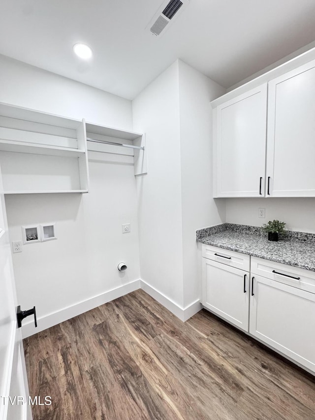816 Hairetown Rd, Jonesborough, TN 37659 - laundry room featuring dark wood-style floors, cabinet space, washer hookup, recessed lighting, and hookup for an electric dryer