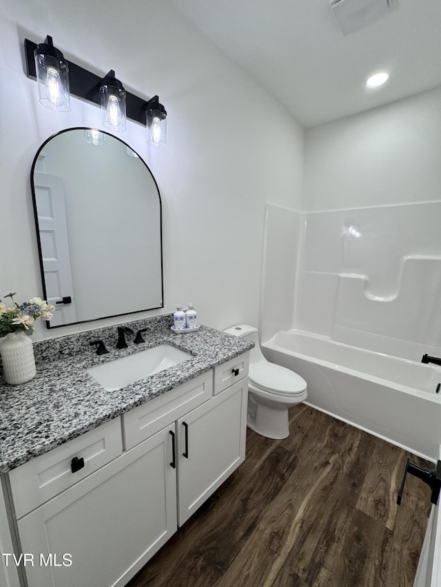 816 Hairetown Rd, Jonesborough, TN 37659 - full bathroom featuring wood finished floors, vanity, and shower / bath combination