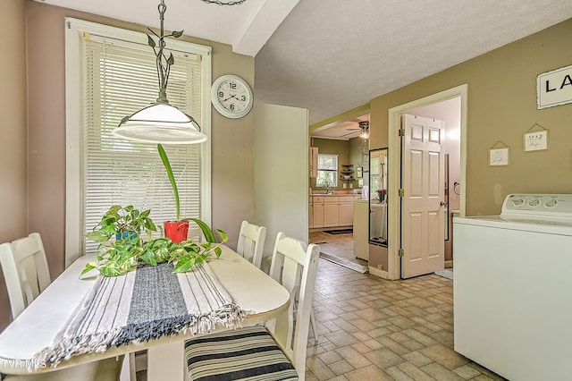 116 Esther St, Bristol, TN 37620 - dining room with washer / dryer, brick patterned flooring, and ceiling fan