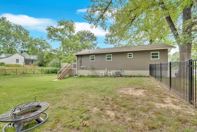 8202 Westland Dr, Knoxville, TN 37919 - back of house with stairway, a fenced backyard, and a wooden deck