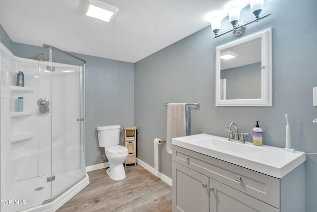 8202 Westland Dr, Knoxville, TN 37919 - bathroom with a shower stall, vanity, and wood finished floors