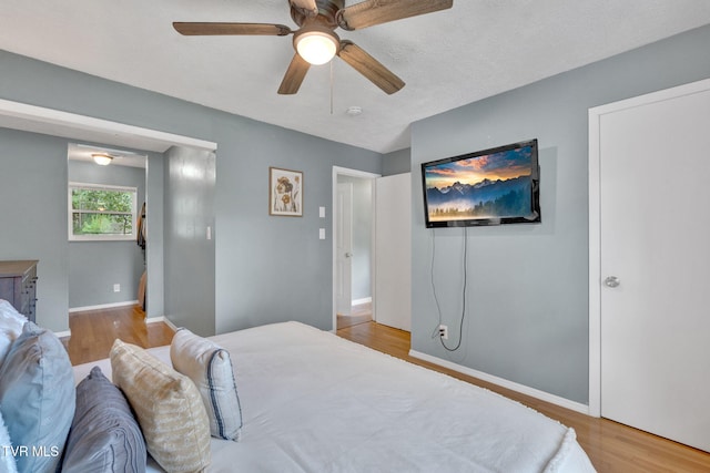 8202 Westland Dr, Knoxville, TN 37919 - bedroom featuring wood finished floors and a ceiling fan