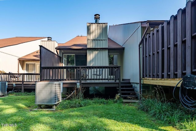780 Hamilton Rd Unit E6, Blountville, TN 37617 - rear view of house featuring a chimney, a wooden deck, and a yard