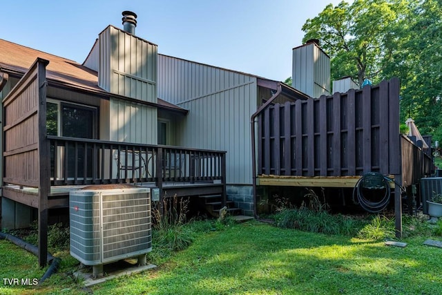 780 Hamilton Rd Unit E6, Blountville, TN 37617 - back of house with a chimney, a deck, and a lawn