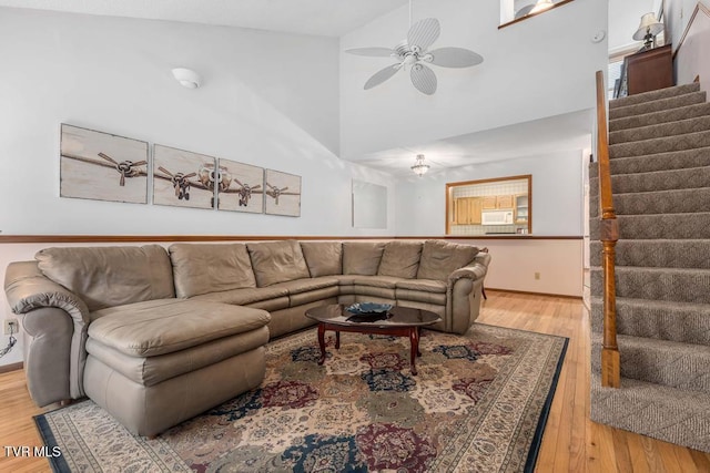 780 Hamilton Rd Unit E6, Blountville, TN 37617 - living area with stairway, wood finished floors, a ceiling fan, and high vaulted ceiling