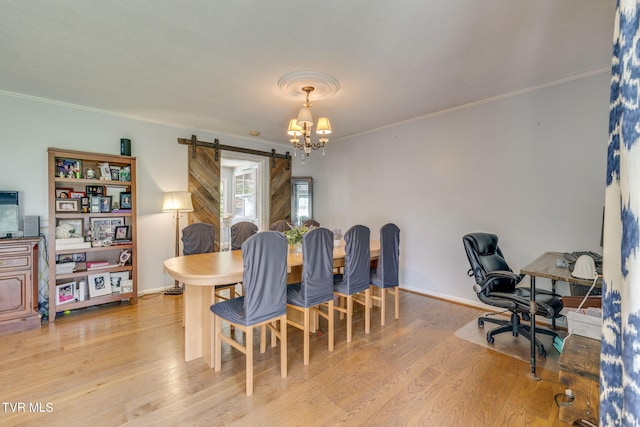 1605 Woodmont Dr, Johnson City, TN 37601 - dining room featuring a barn door, ornamental molding, light wood finished floors, a chandelier, and an office area