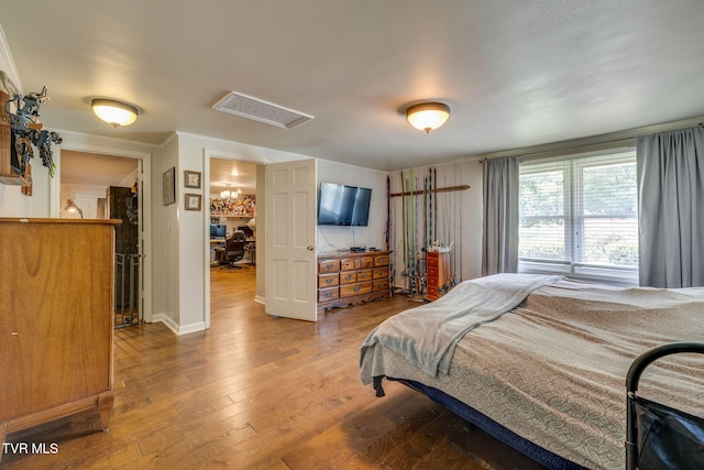 1605 Woodmont Dr, Johnson City, TN 37601 - bedroom with attic access and wood finished floors
