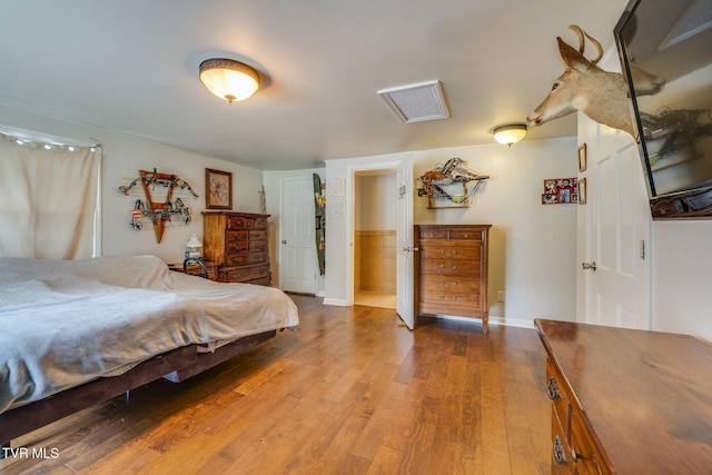 1605 Woodmont Dr, Johnson City, TN 37601 - bedroom with attic access and wood finished floors