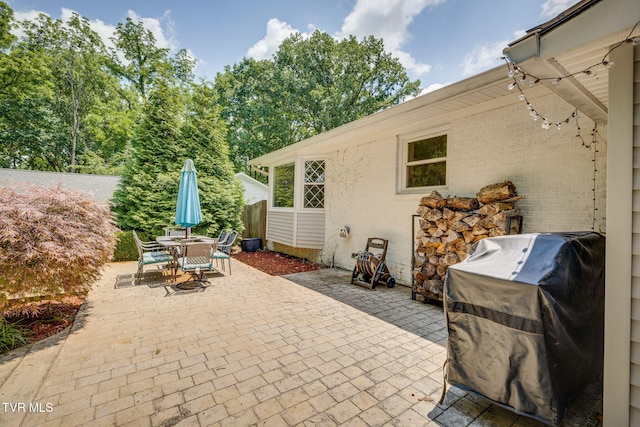 1605 Woodmont Dr, Johnson City, TN 37601 - view of patio featuring a grill and outdoor dining space