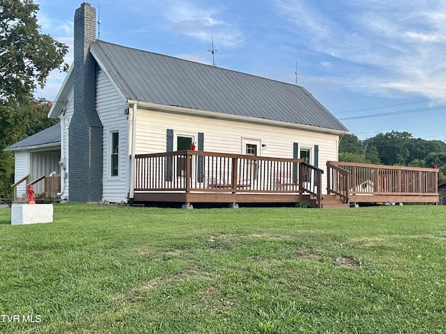 654 W Valley Dr, Kingsport, TN 37664 - rear view of property with a chimney, a metal roof, a deck, and a yard
