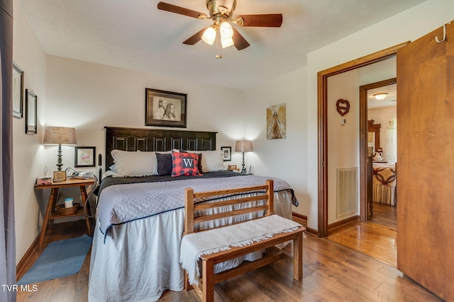 2129 Philon Dr, Kingsport, TN 37660 - bedroom with hardwood / wood-style flooring and a ceiling fan