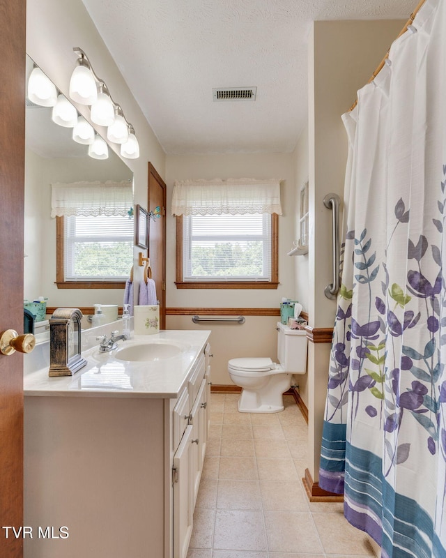 2129 Philon Dr, Kingsport, TN 37660 - full bathroom featuring vanity, tile patterned flooring, and curtained shower