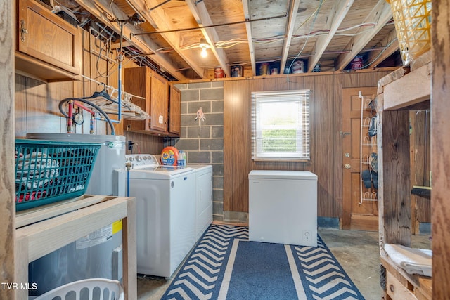 2129 Philon Dr, Kingsport, TN 37660 - laundry area with cabinet space, washing machine and dryer, and wooden walls
