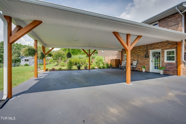 2129 Philon Dr, Kingsport, TN 37660 - view of patio / terrace with a carport and a storage shed