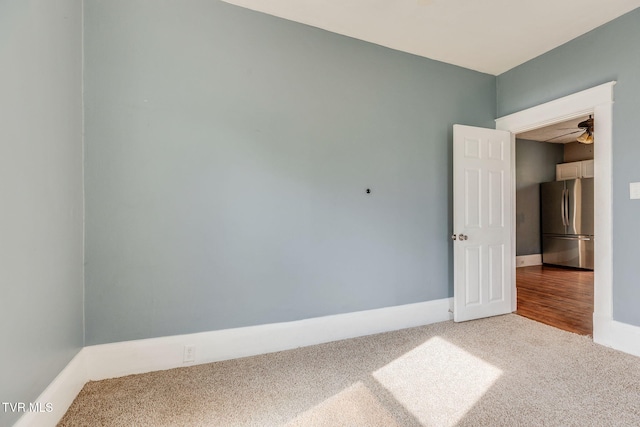 1234 E Center St, Kingsport, TN 37660 - empty room featuring carpet and ceiling fan