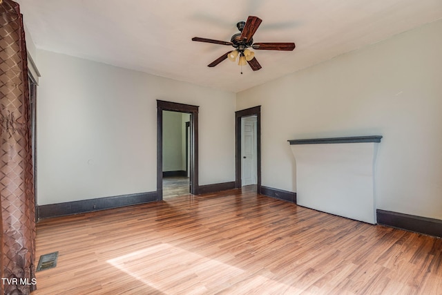 1234 E Center St, Kingsport, TN 37660 - spare room with wood finished floors and ceiling fan