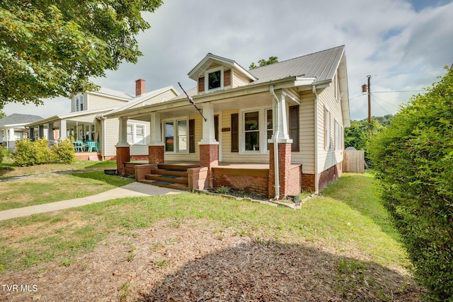 1234 E Center St, Kingsport, TN 37660 - view of front of property featuring a porch and a front lawn