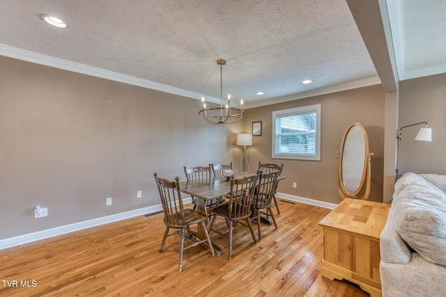 605 Dickerson St, Kingsport, TN 37665 - dining room featuring a chandelier, crown molding, light wood-style flooring, a textured ceiling, and recessed lighting