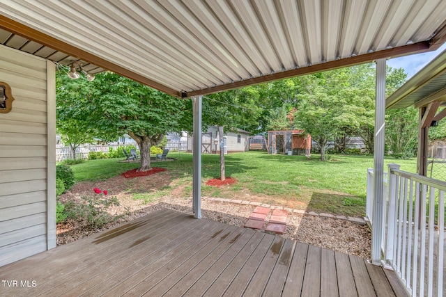 605 Dickerson St, Kingsport, TN 37665 - wooden terrace with a fenced backyard and a storage shed