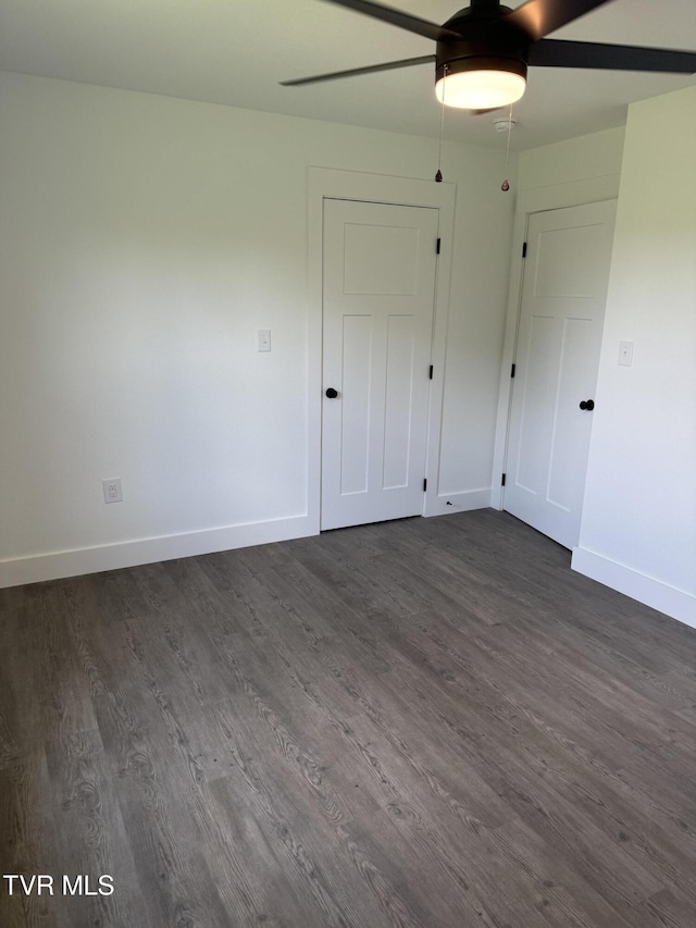 5920 Snapps Ferry Rd, Afton, TN 37616 - unfurnished bedroom with dark wood-style flooring and a ceiling fan