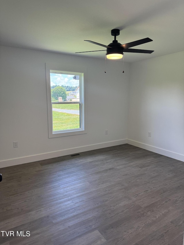 5920 Snapps Ferry Rd, Afton, TN 37616 - empty room with dark wood finished floors and ceiling fan