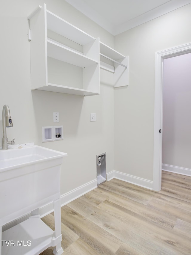 77 Sunset Rd, Johnson City, TN 37615 - laundry area featuring light wood-style floors, washer hookup, and electric dryer hookup