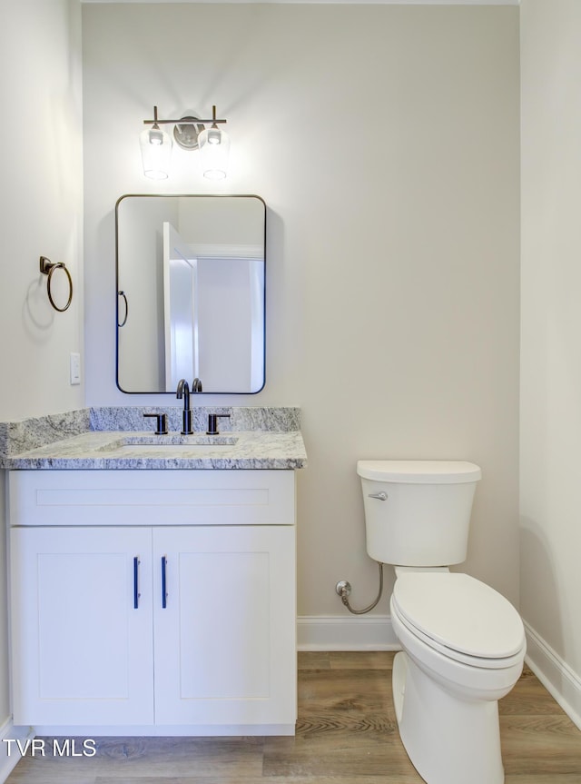 77 Sunset Rd, Johnson City, TN 37615 - bathroom with wood finished floors and vanity