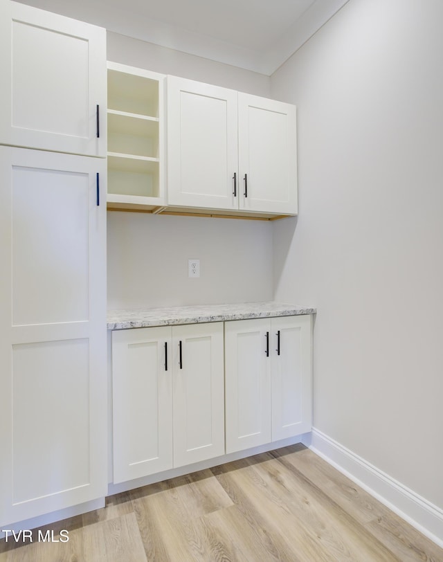 77 Sunset Rd, Johnson City, TN 37615 - detailed view of wood finished floors and baseboards
