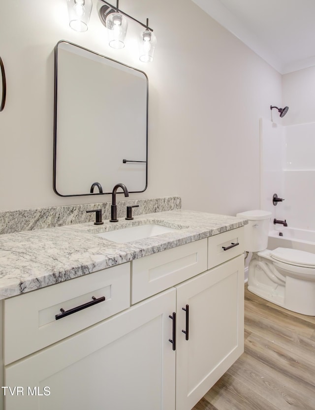 77 Sunset Rd, Johnson City, TN 37615 - bathroom featuring vanity, wood finished floors, shower / tub combination, and ornamental molding