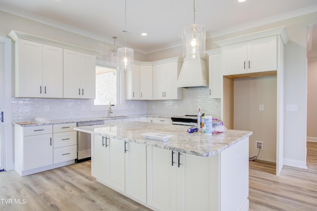 77 Sunset Rd, Johnson City, TN 37615 - kitchen featuring stainless steel dishwasher, a kitchen island, white cabinets, light wood-style floors, and recessed lighting