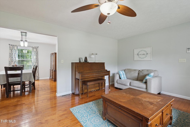 4404 Stillwood Ave, Kingsport, TN 37664 - living room featuring a ceiling fan and light wood-style flooring