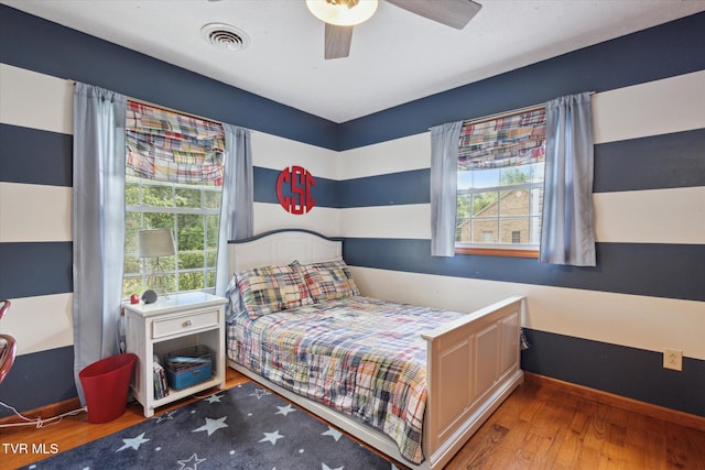 4404 Stillwood Ave, Kingsport, TN 37664 - bedroom featuring wood finished floors and ceiling fan