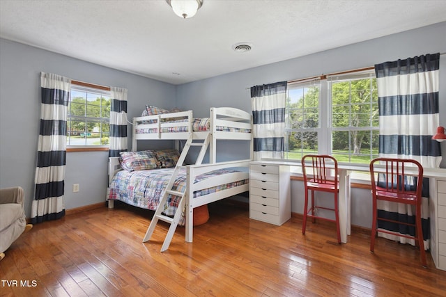 4404 Stillwood Ave, Kingsport, TN 37664 - bedroom with wood-type flooring and baseboards