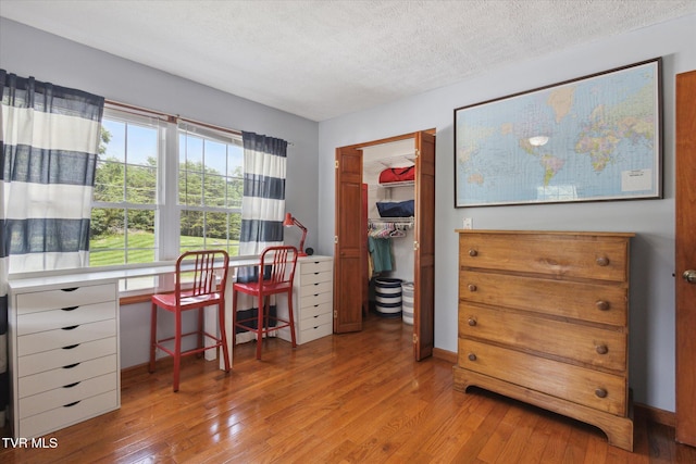 4404 Stillwood Ave, Kingsport, TN 37664 - office area featuring hardwood / wood-style floors and a textured ceiling