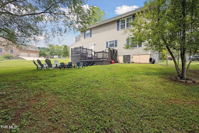 4404 Stillwood Ave, Kingsport, TN 37664 - back of house featuring a wooden deck and a fire pit
