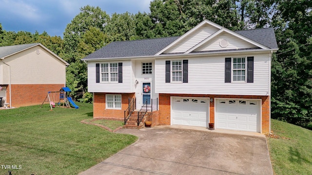 5630 Orebank Rd, Kingsport, TN 37664 - split foyer home with driveway, a garage, brick siding, a front lawn, and a playground