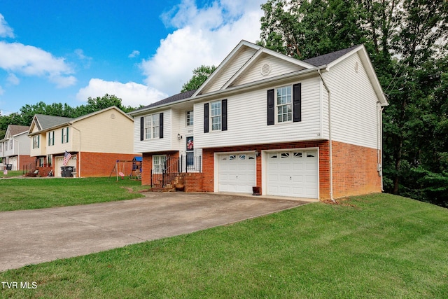 5630 Orebank Rd, Kingsport, TN 37664 - split foyer home featuring brick siding, an attached garage, concrete driveway, and a front lawn
