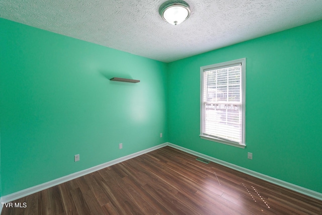 5630 Orebank Rd, Kingsport, TN 37664 - spare room with dark wood-style floors and a textured ceiling